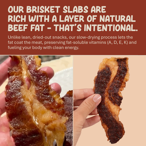 Grazly beef brisket slab held in hand showing natural layer of beef fat
